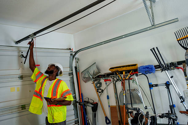 Professional Garage Door Panel Replacement technician working in Royal Palm Estates, FL